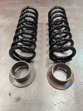 300lb, 3.5” dia, 10” tall coil (rear)