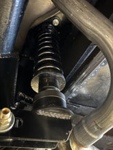 300lb, 3.5” dia, 10” tall coil (rear)